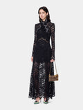 Long dress in black layered lace with silver eyelets details