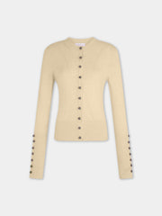 Cardigan en maille jaune Dinh Van x Rabanne avec bijoux signature