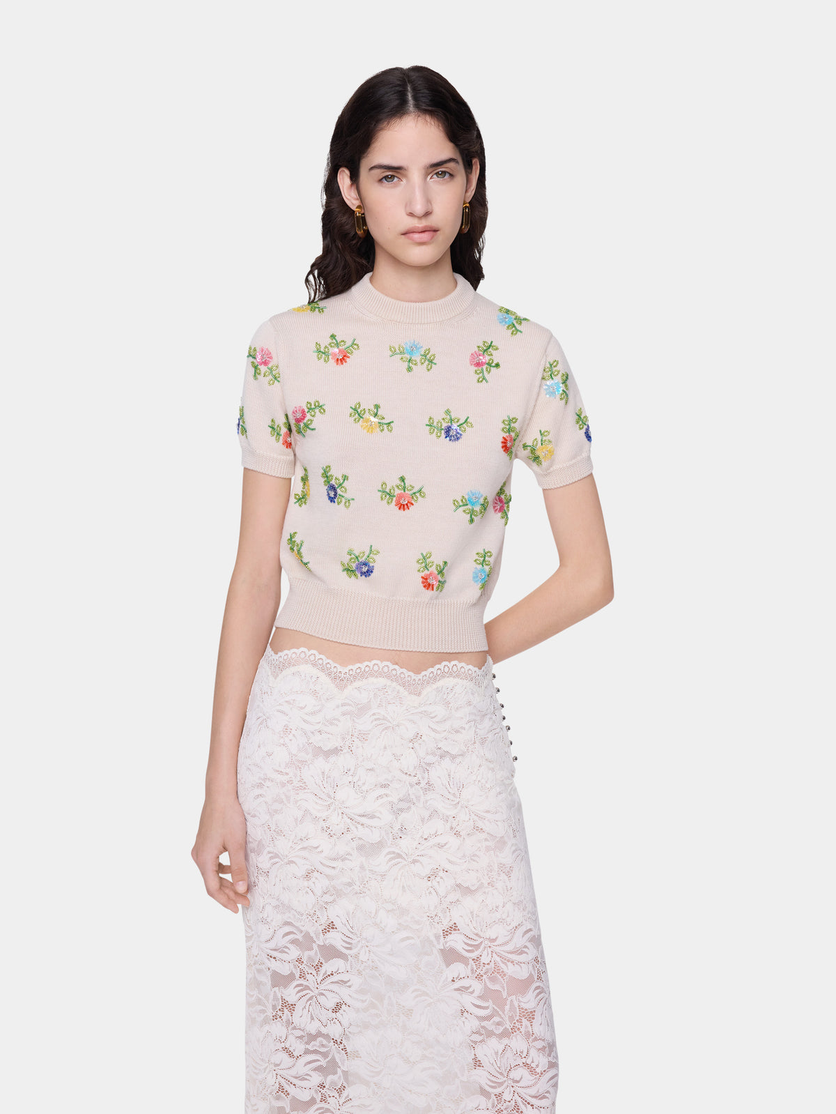 Top en laine beige avec broderie florale multicolore
