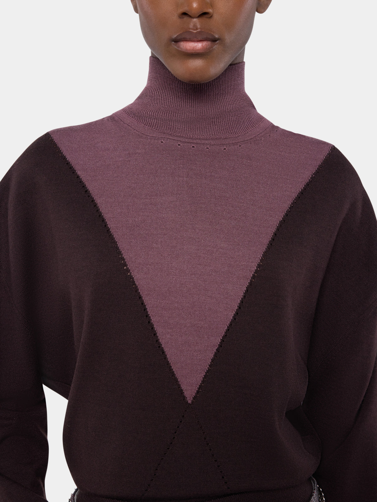 Bicolor long sleeved knit top with contrasting turtleneck