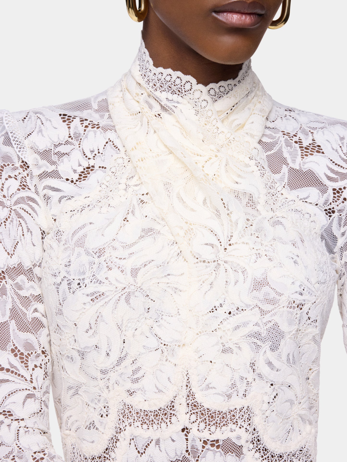 Top manches longues en dentelle col montant