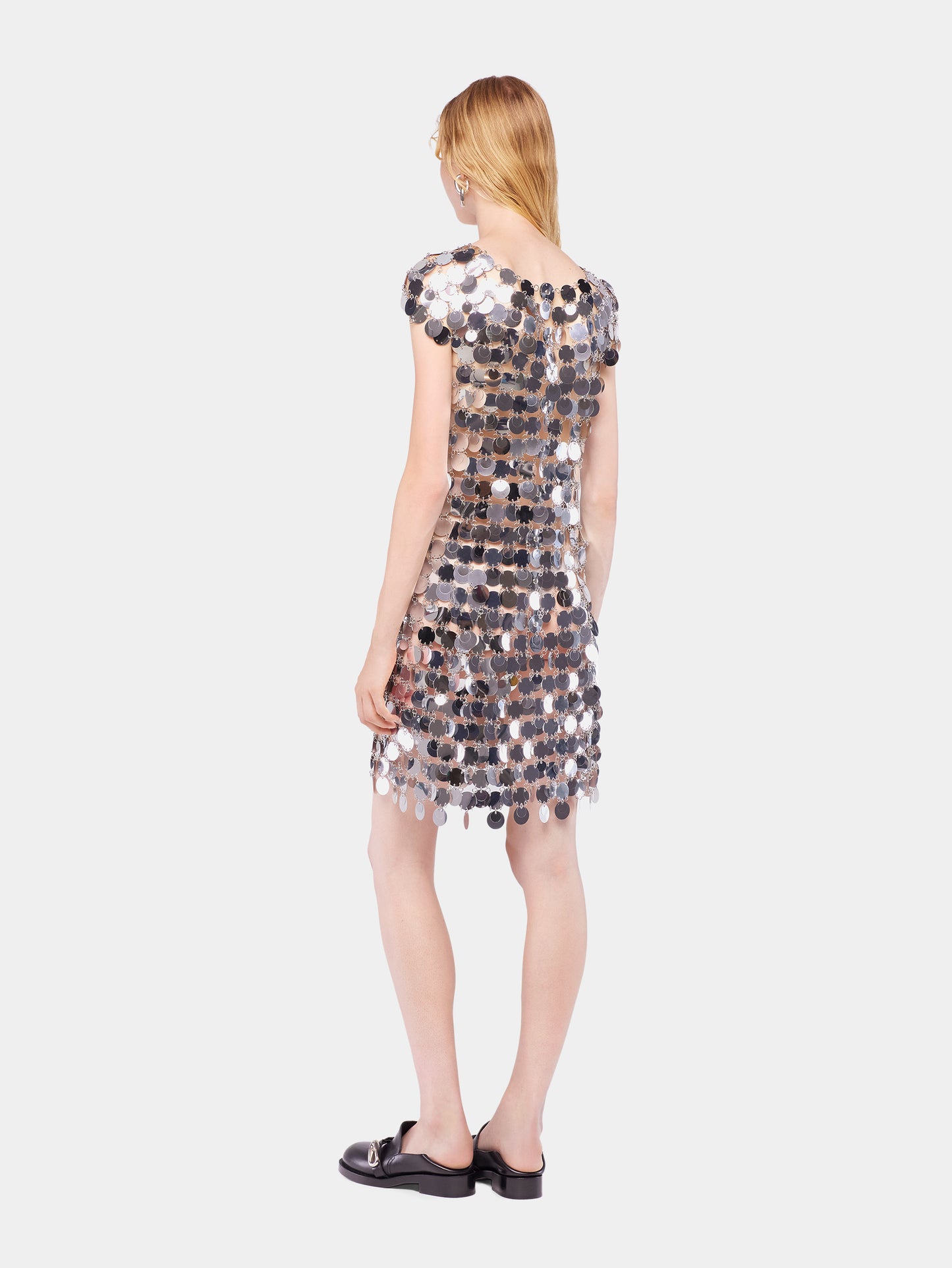 The iconic silver sparkle discs dress
