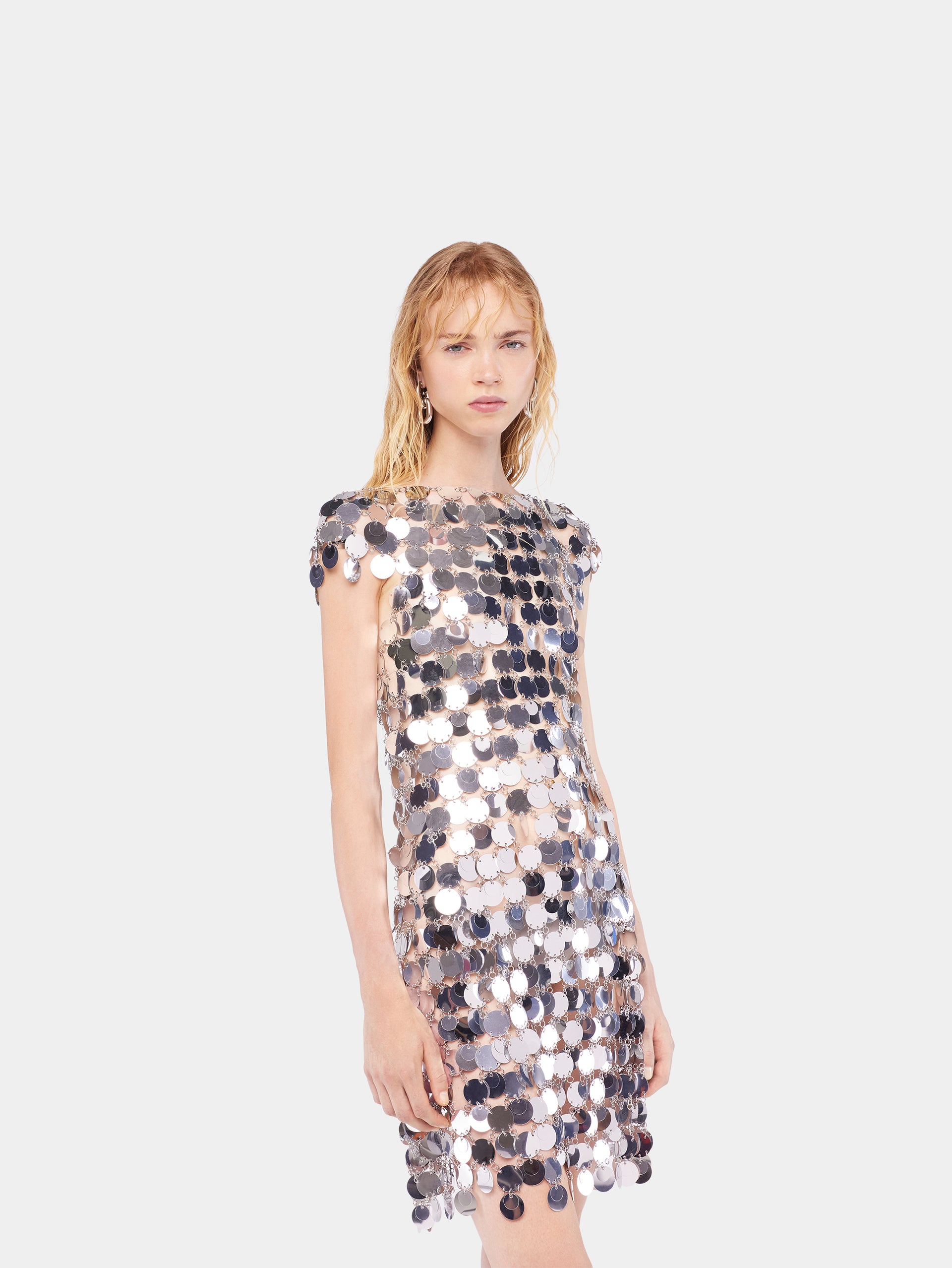The iconic silver sparkle discs dress