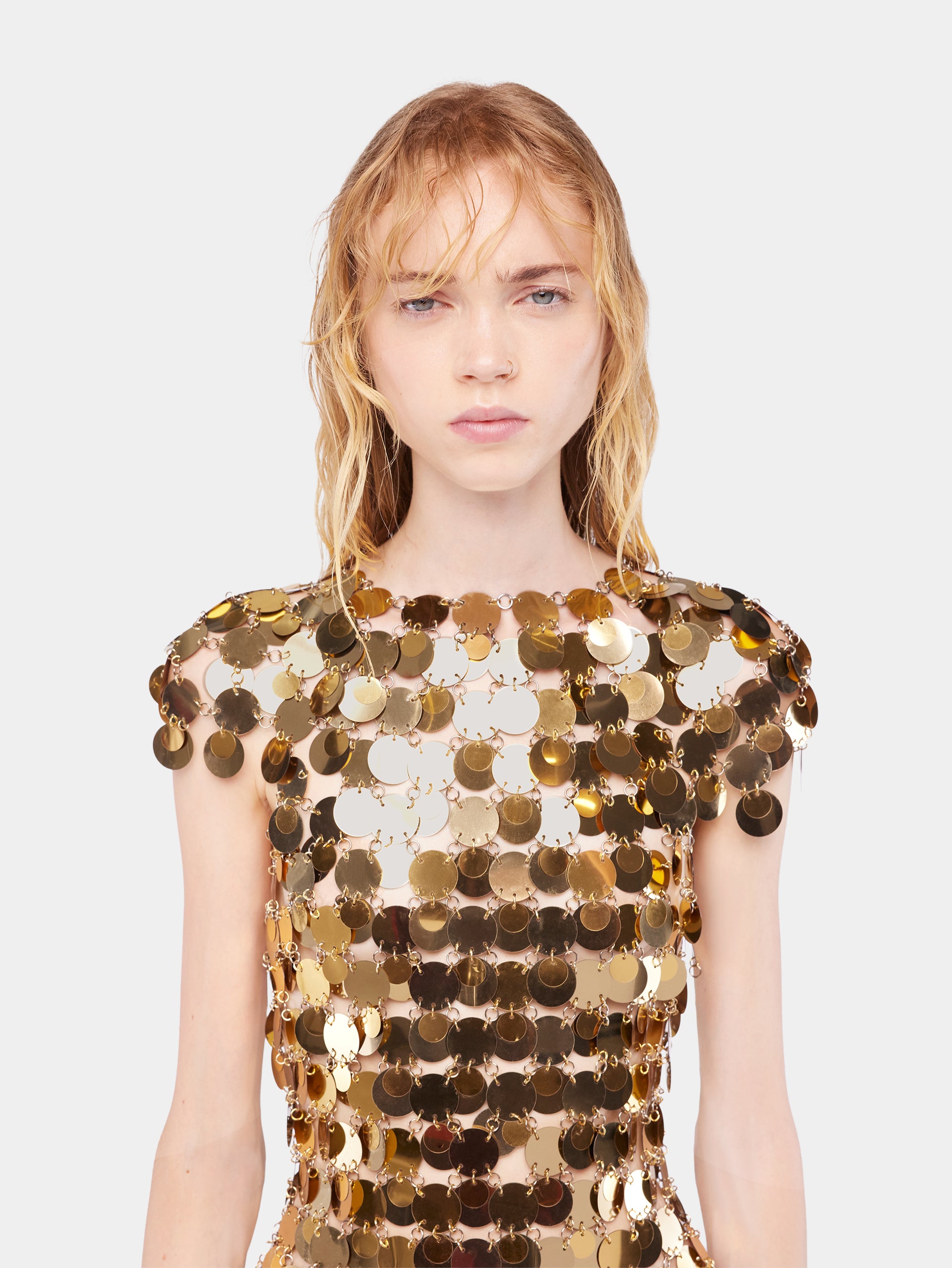 The iconic gold Sparkle disc dress