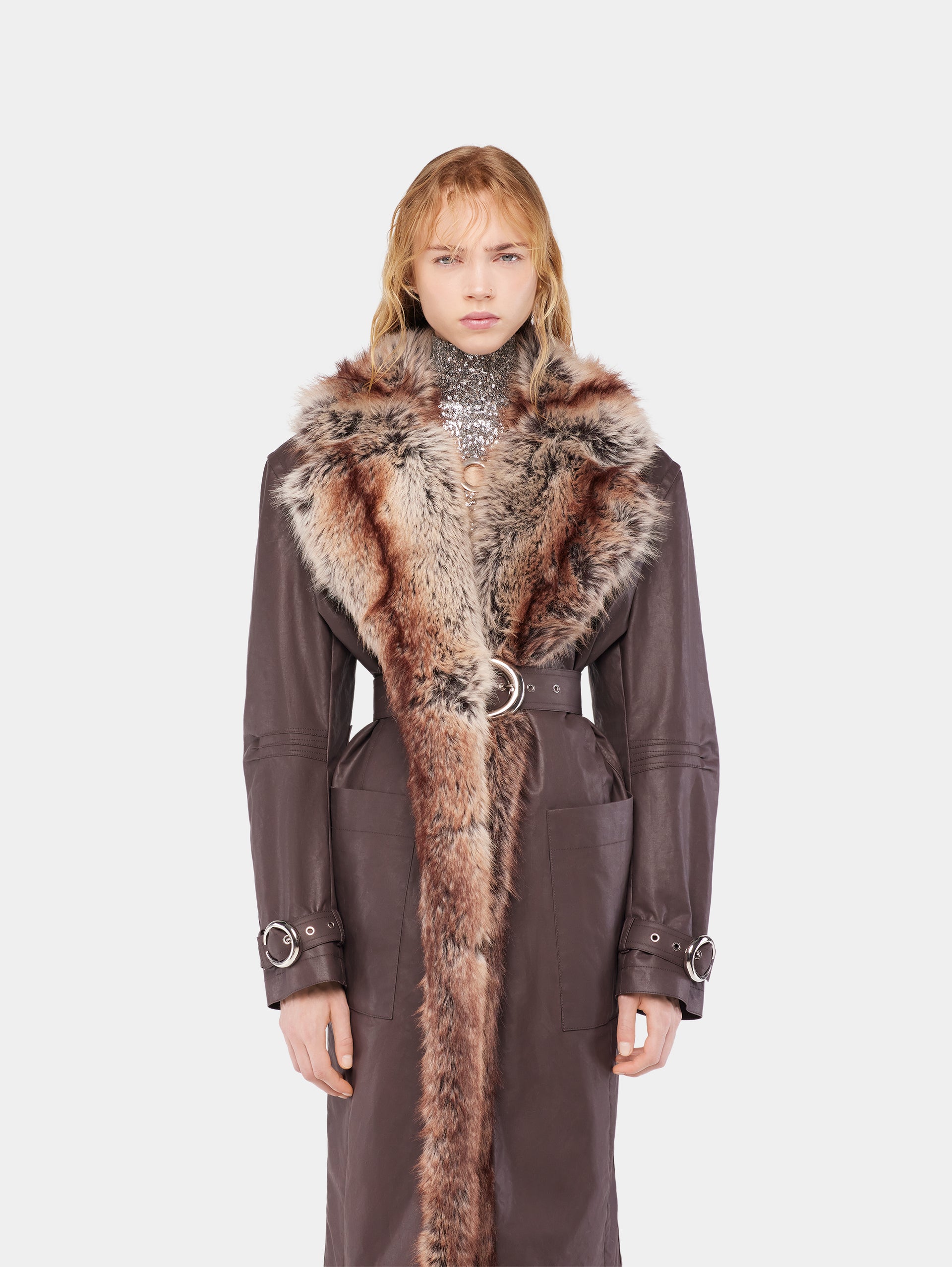 Trench coat with fake fur trims