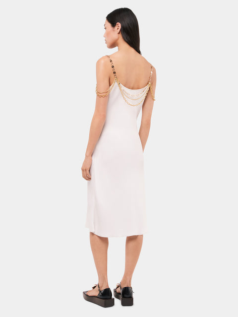 Light pleated white dress embellished with  