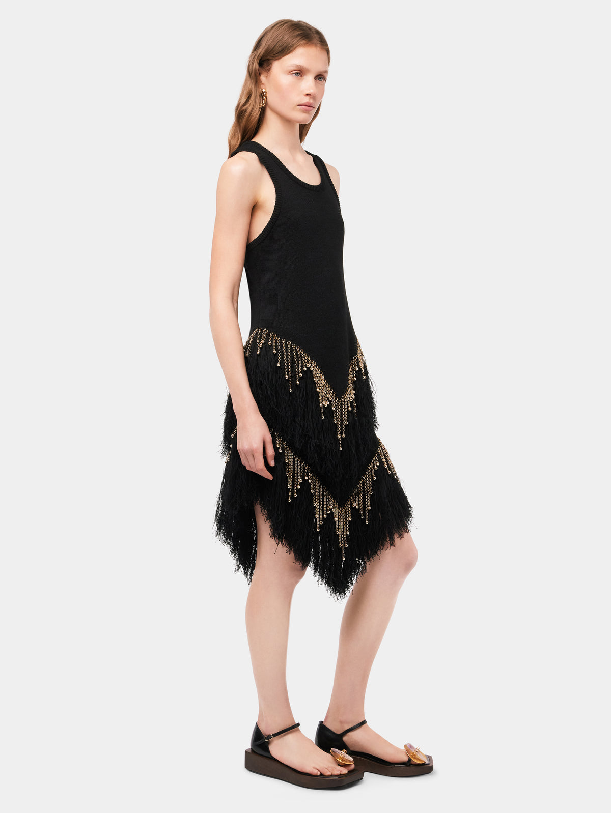 Black woven skirt with knitted beads and feathers