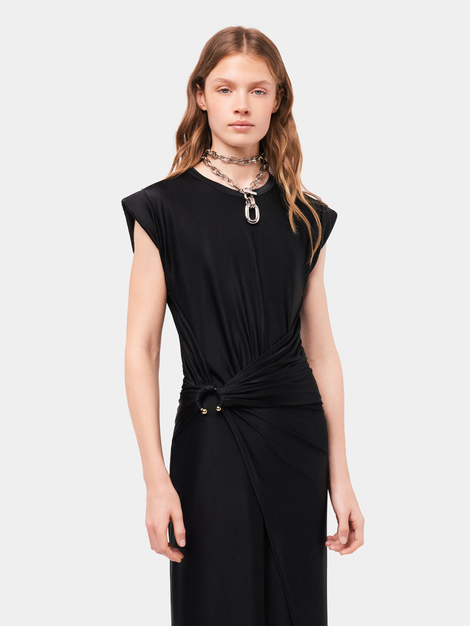 Black drapé pression dress with signature piercing
