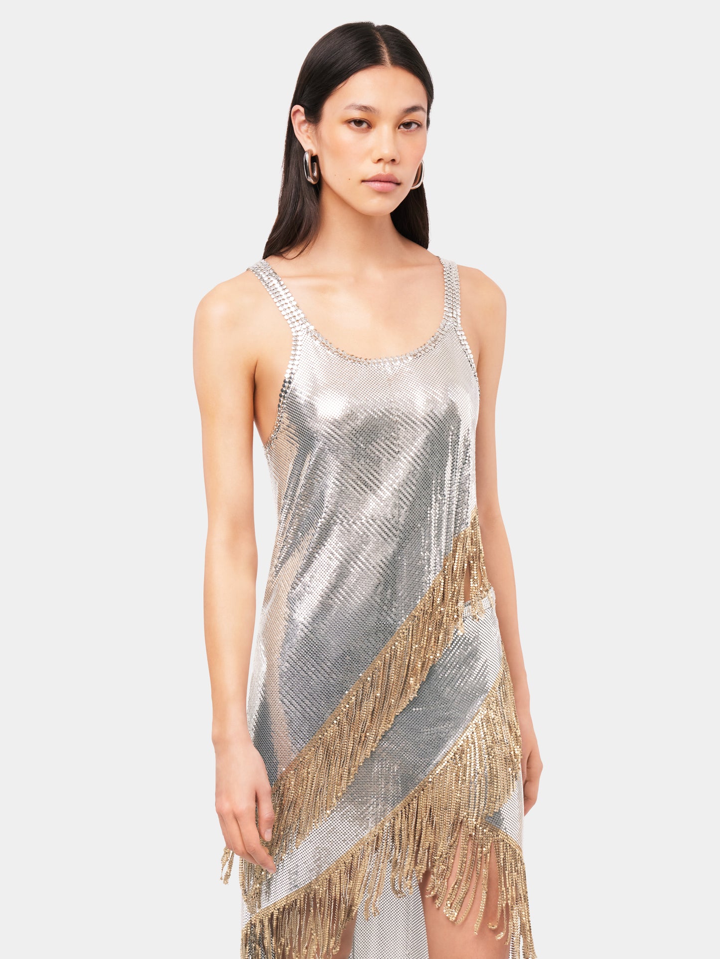 Asymetrical chainmail top with golden metallic fringes