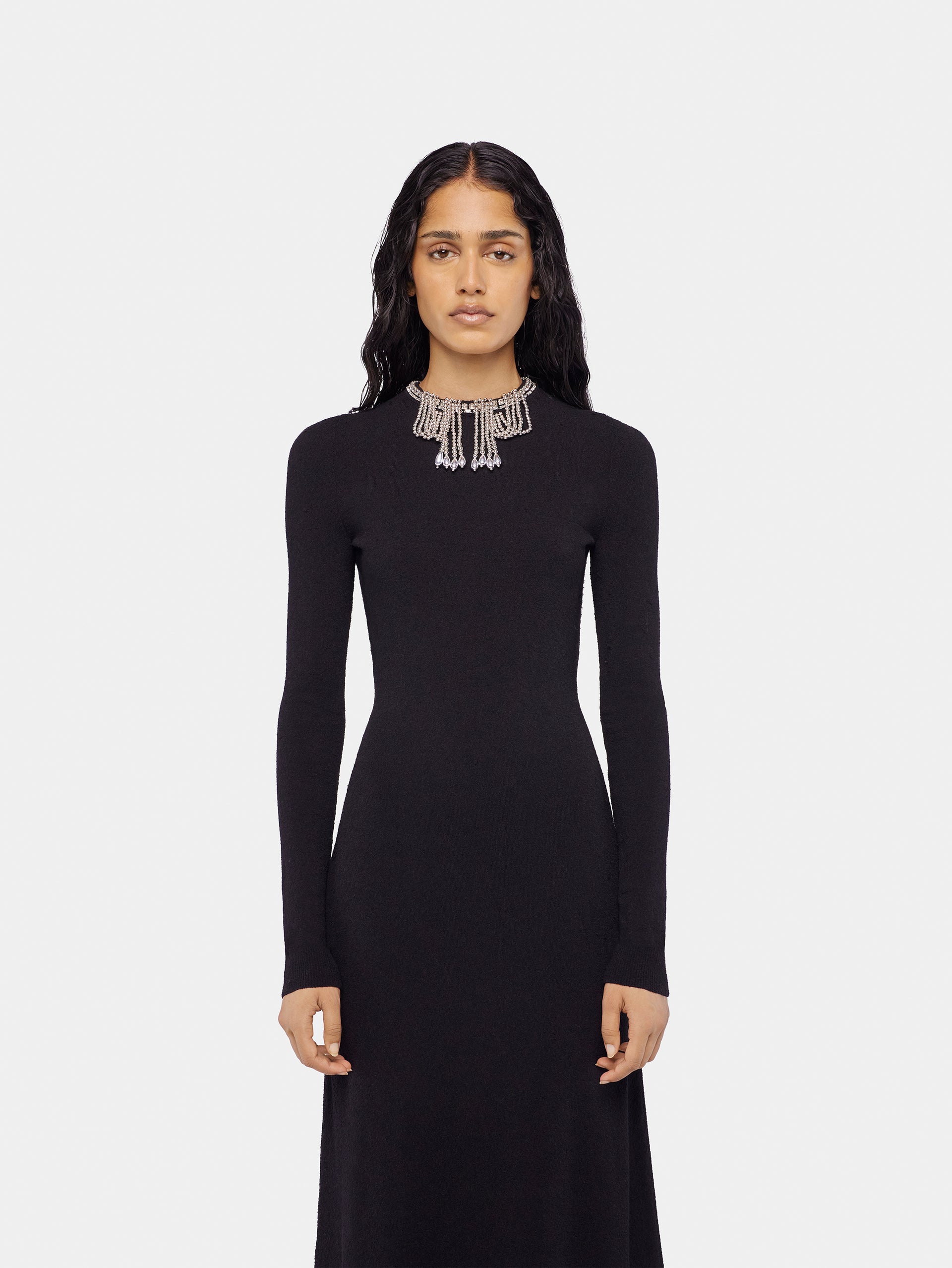 Long backless knit dress with embroideries