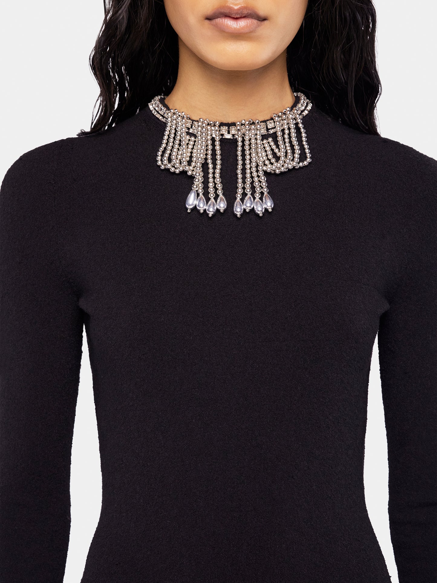 Long backless knit dress with embroideries