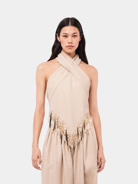 Sand colored top in wool embelished with metallic fringe details