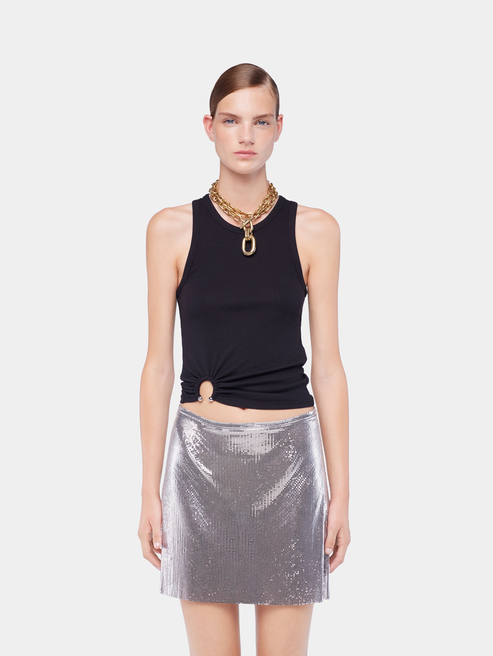 Black tank top with signature piercing