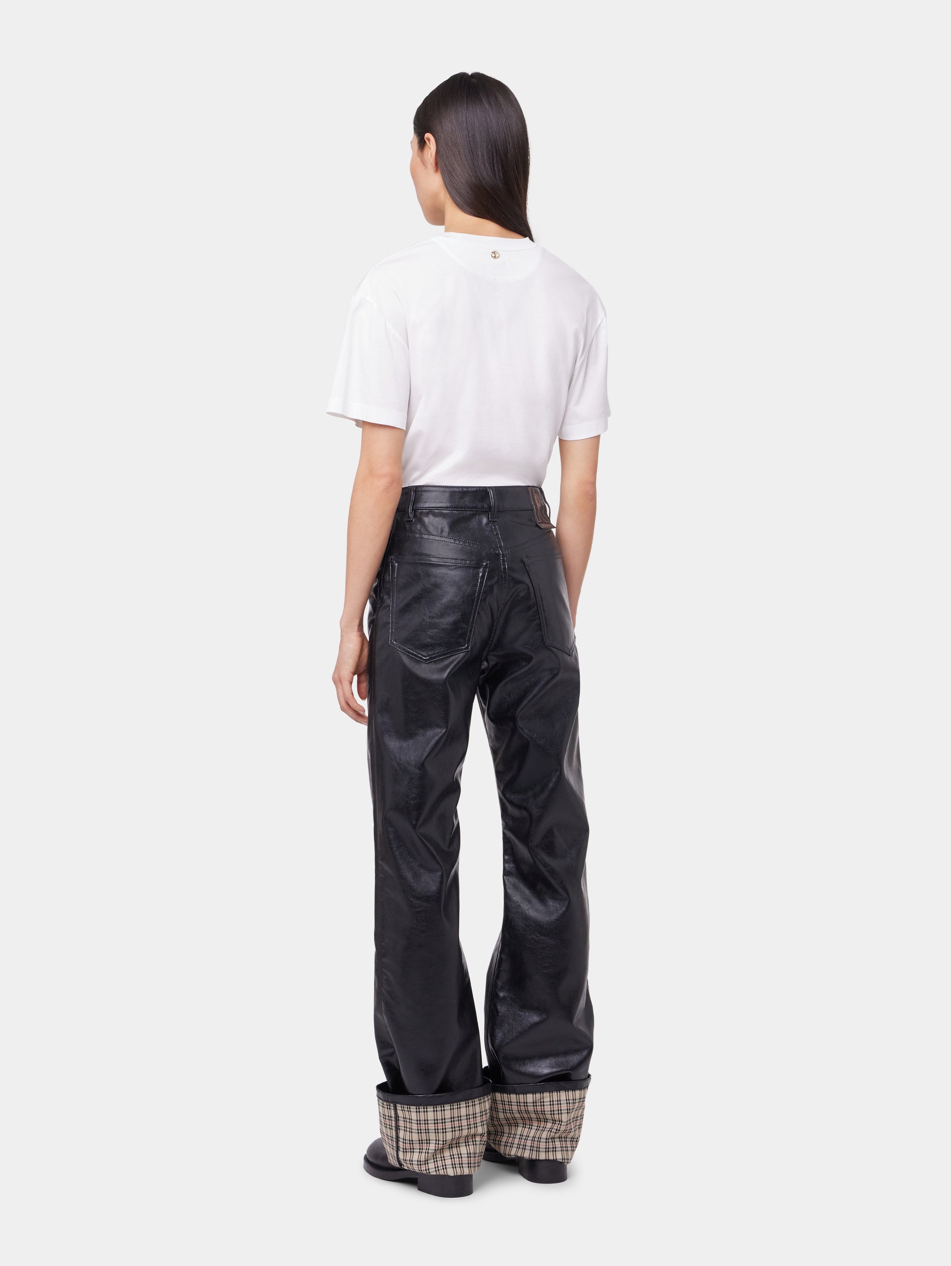 BLACK FLARED TROUSERS IN IMITATION LEATHER