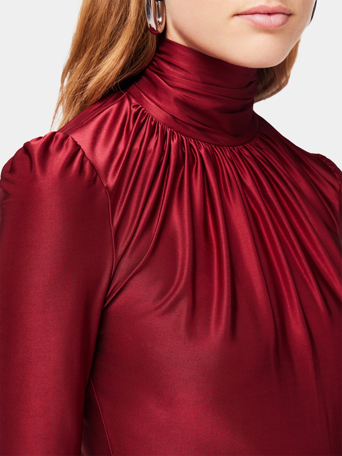 Draped ruby turtleneck