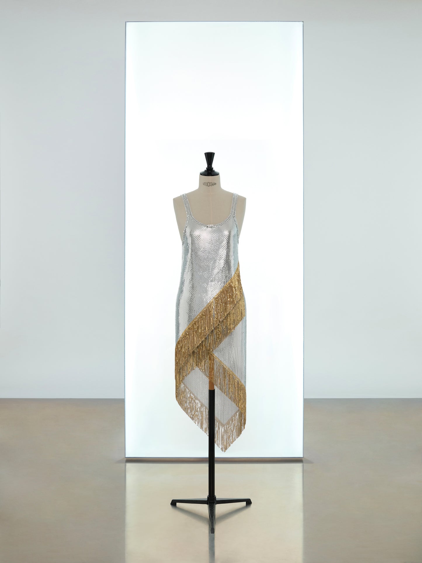 Asymmetric tunic and wrap skirt in mesh
