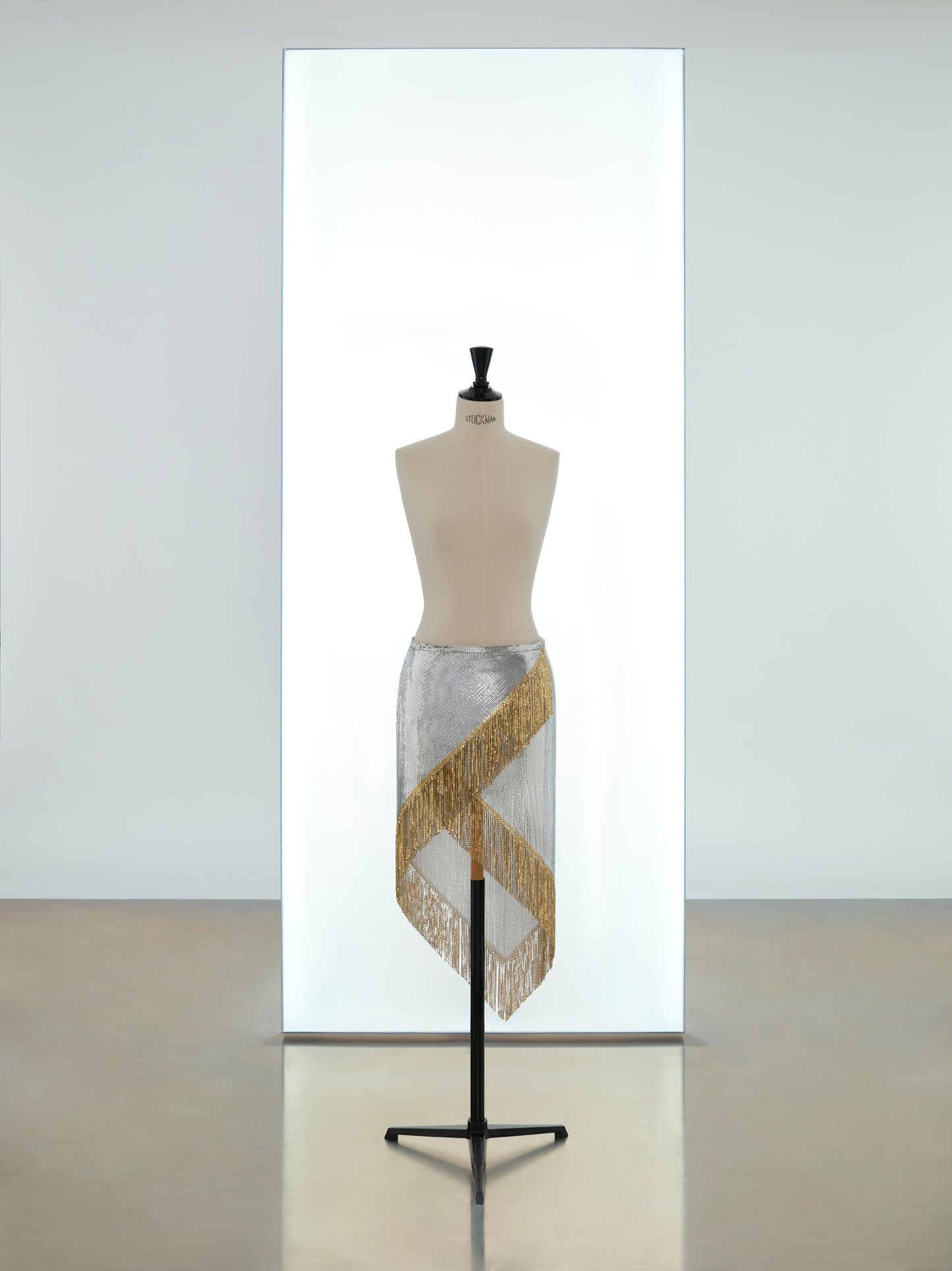 Asymmetric tunic and wrap skirt in mesh
