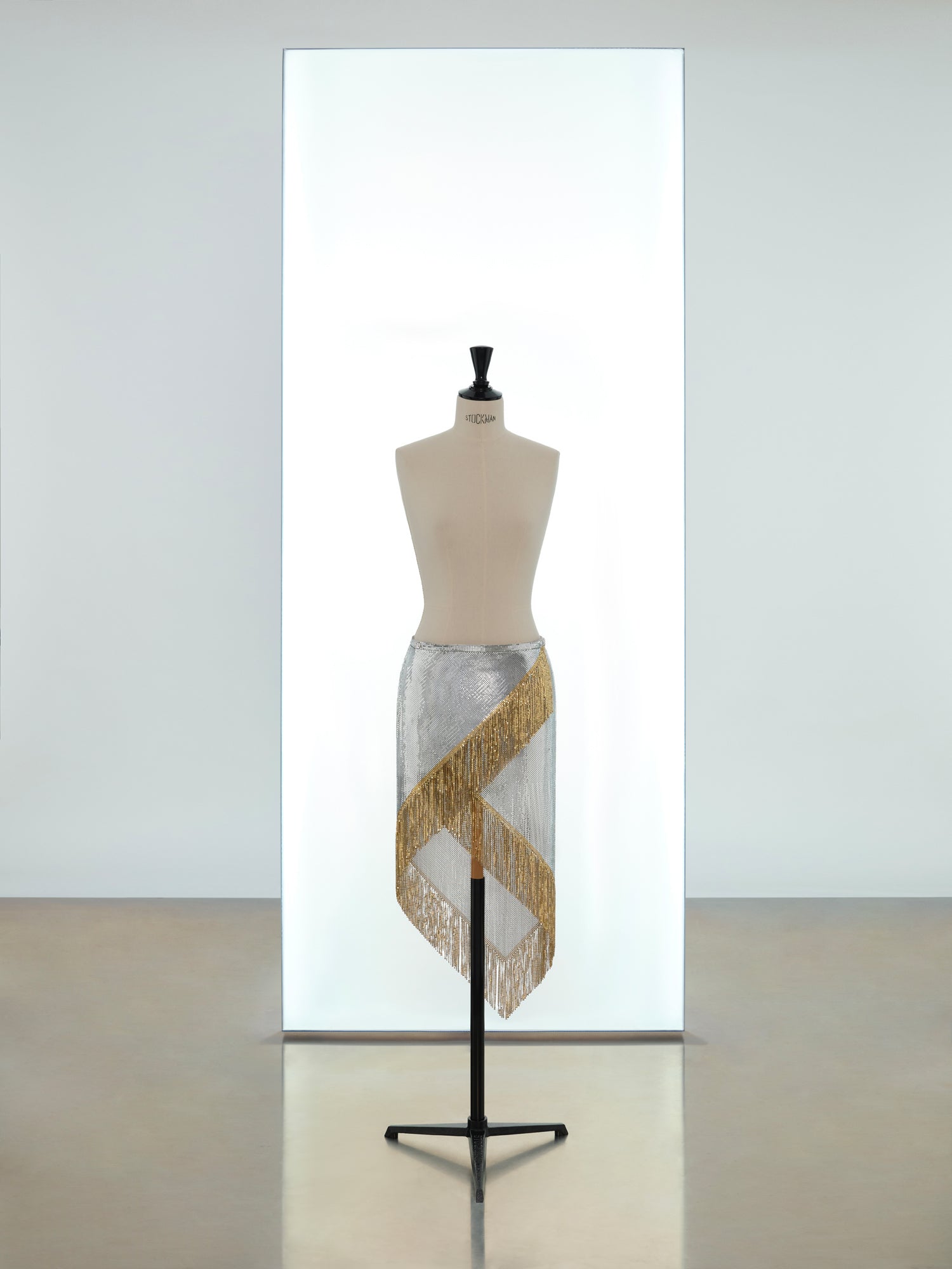 Asymmetric tunic and wrap skirt in mesh