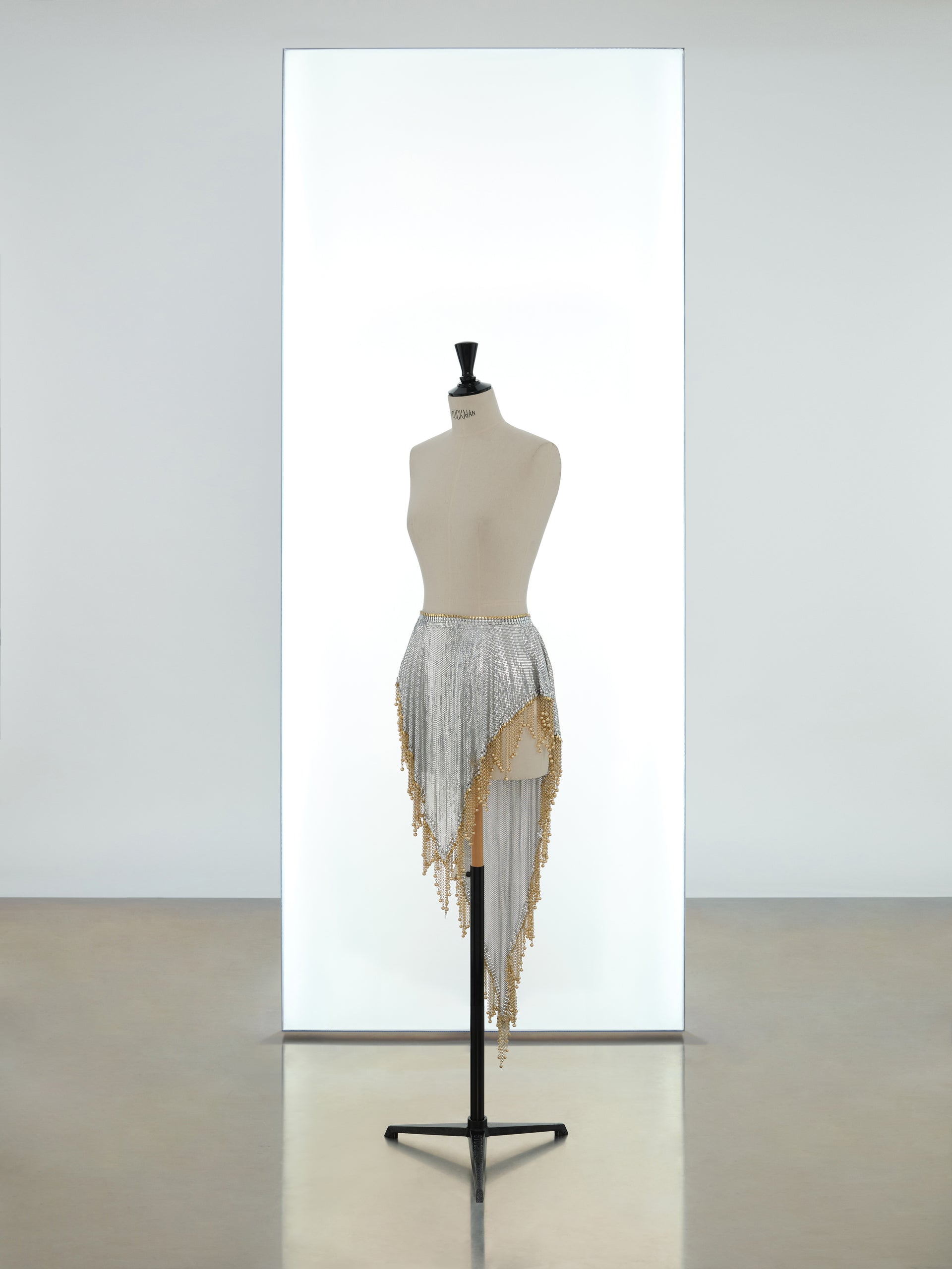 Draped asymmetric skirt made in iconic mesh