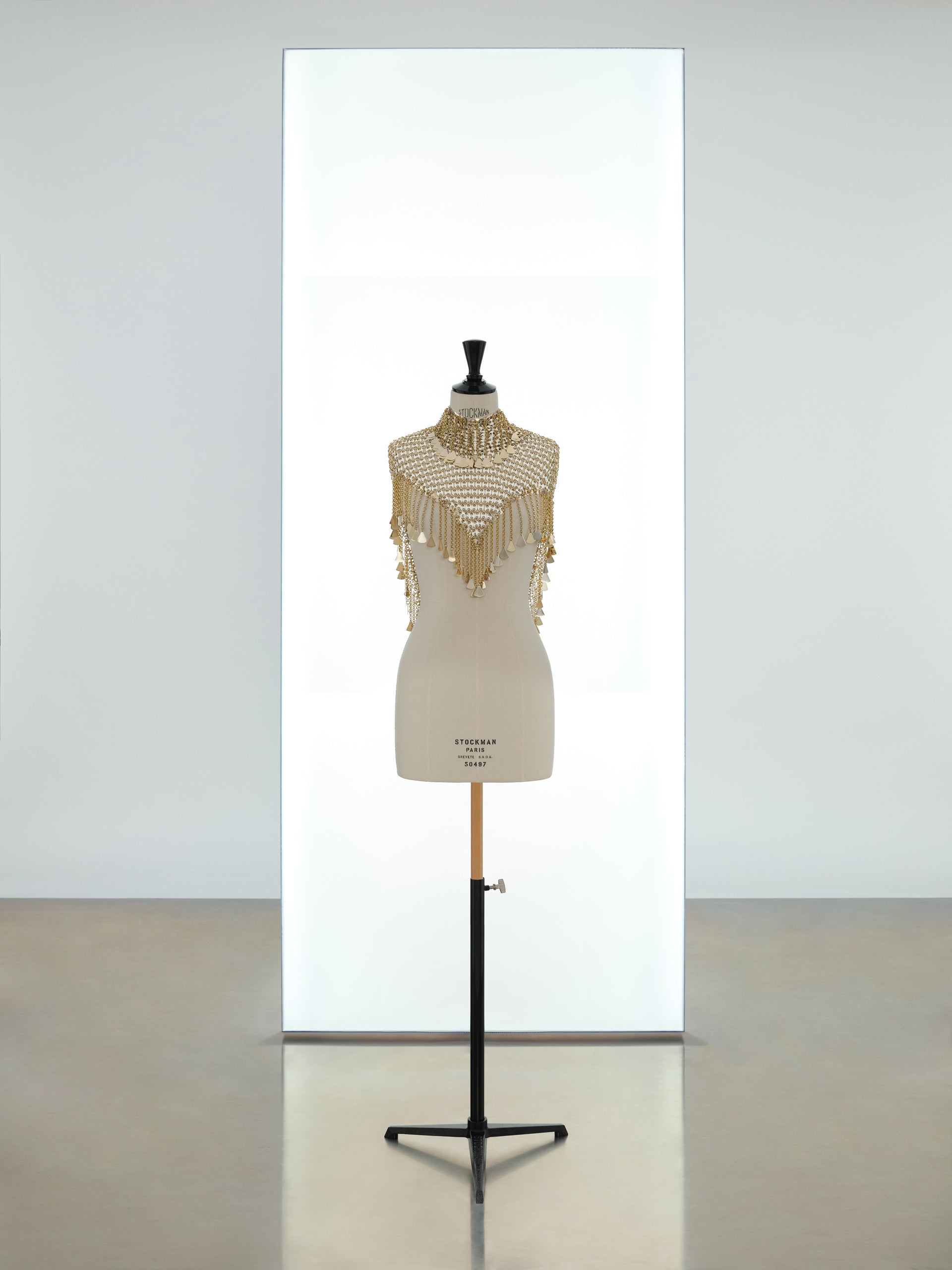 Mini hooded top made in metallic eight assembly