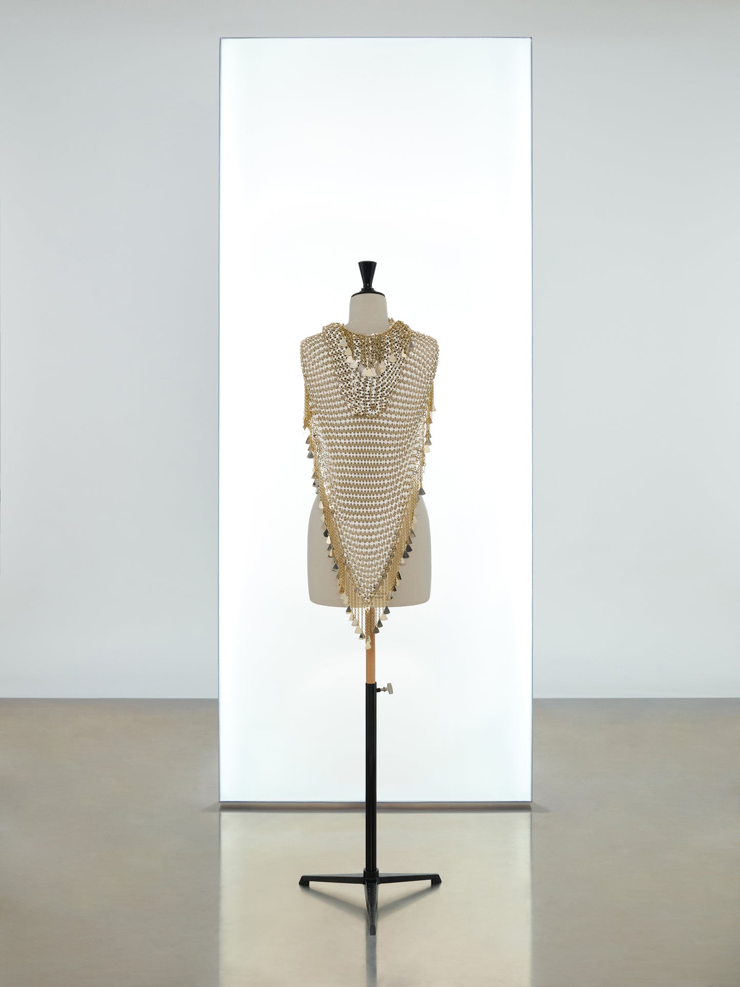 Mini hooded top made in metallic eight assembly