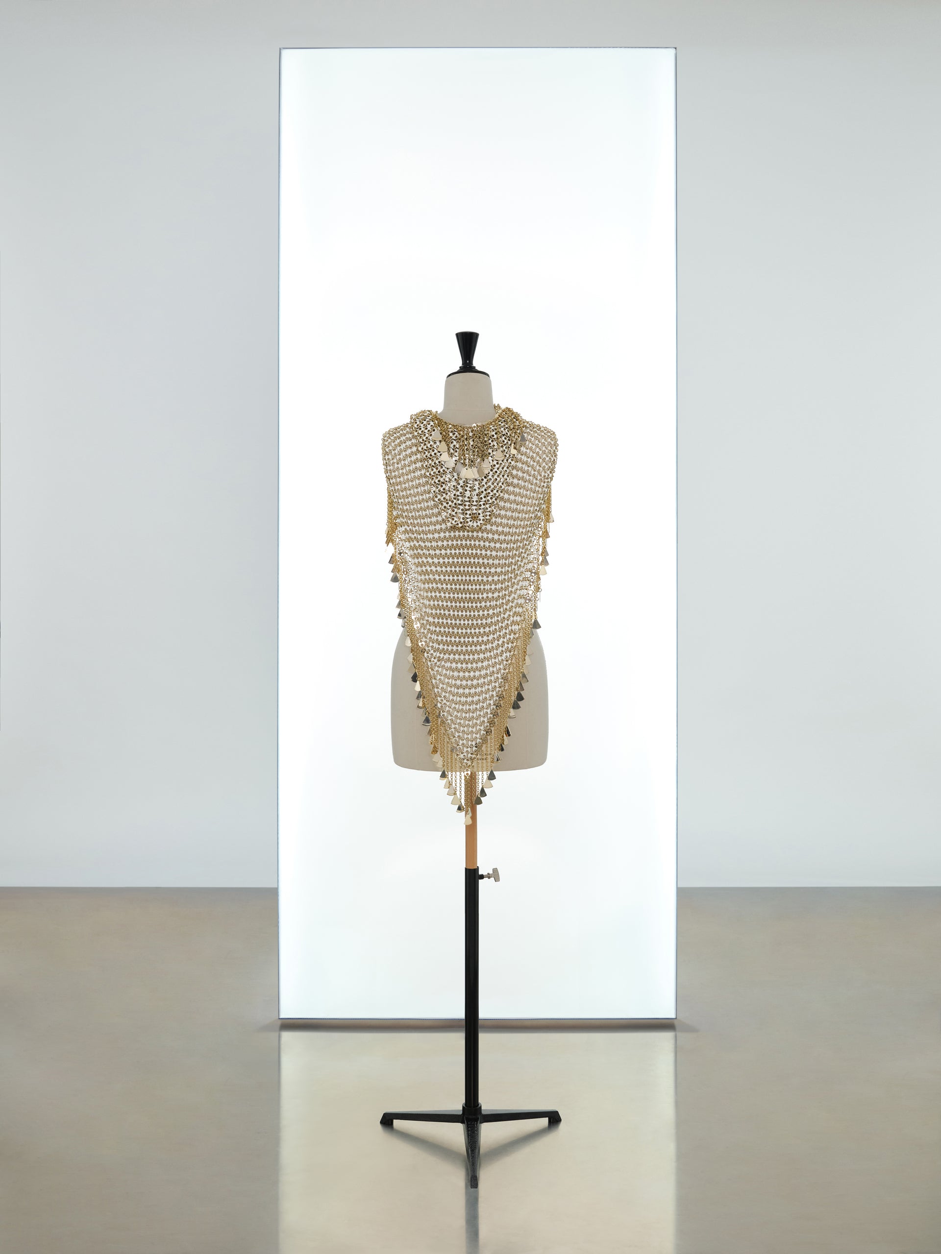 Mini hooded top made in metallic eight assembly