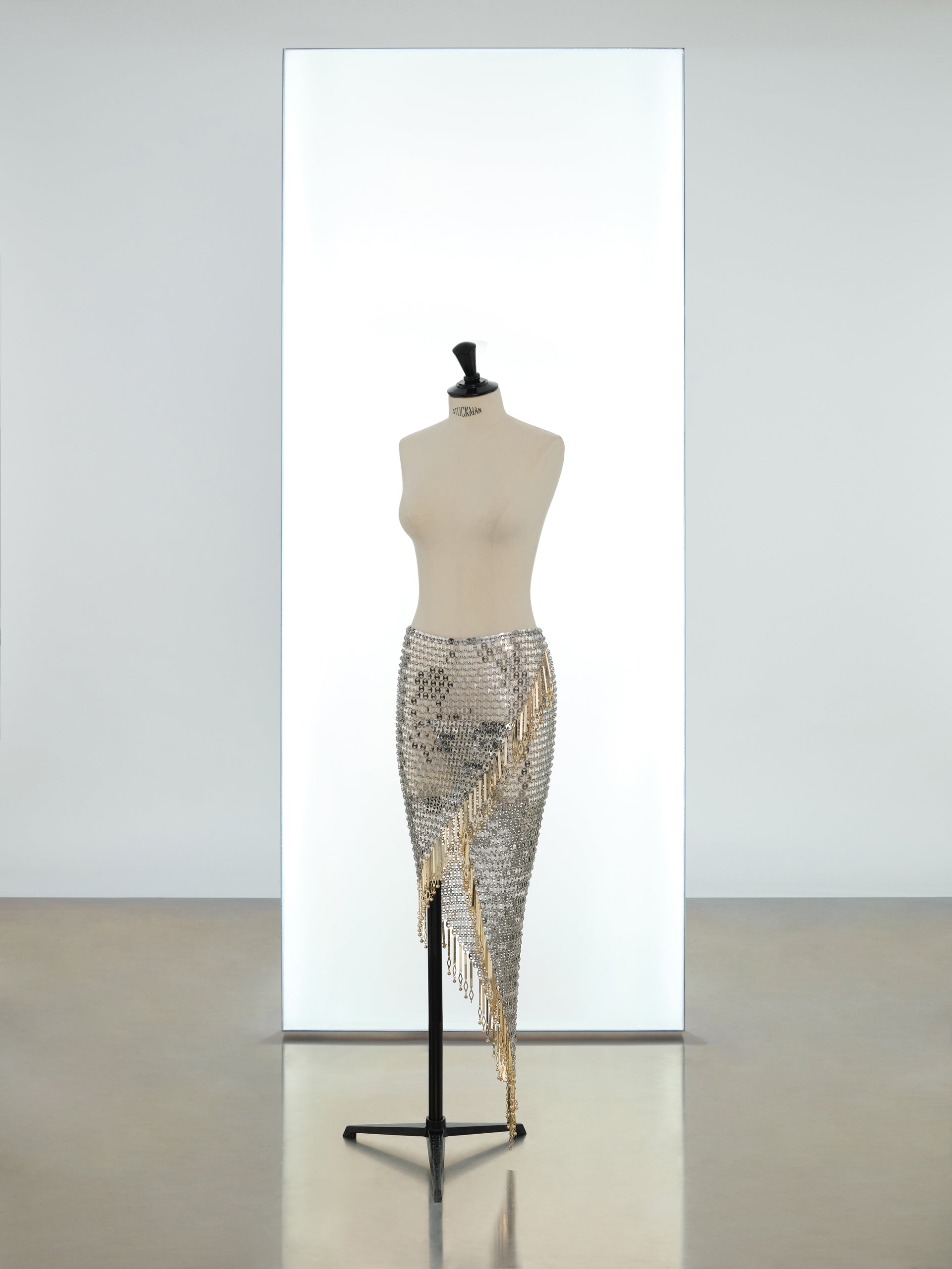 Mid length wrap skirt made in metallic eight assembly