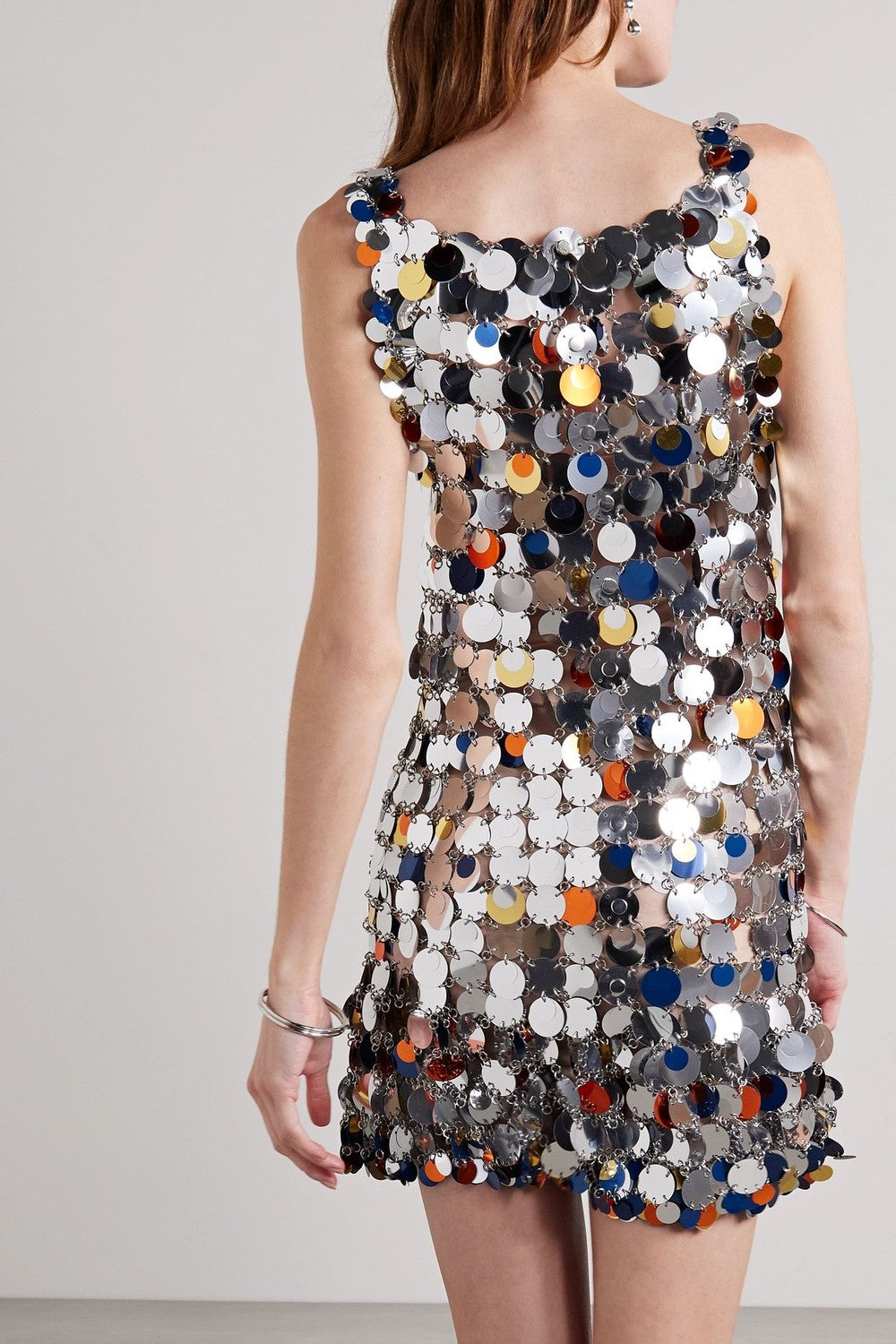 Assembled dress with multicolored sparkle discs