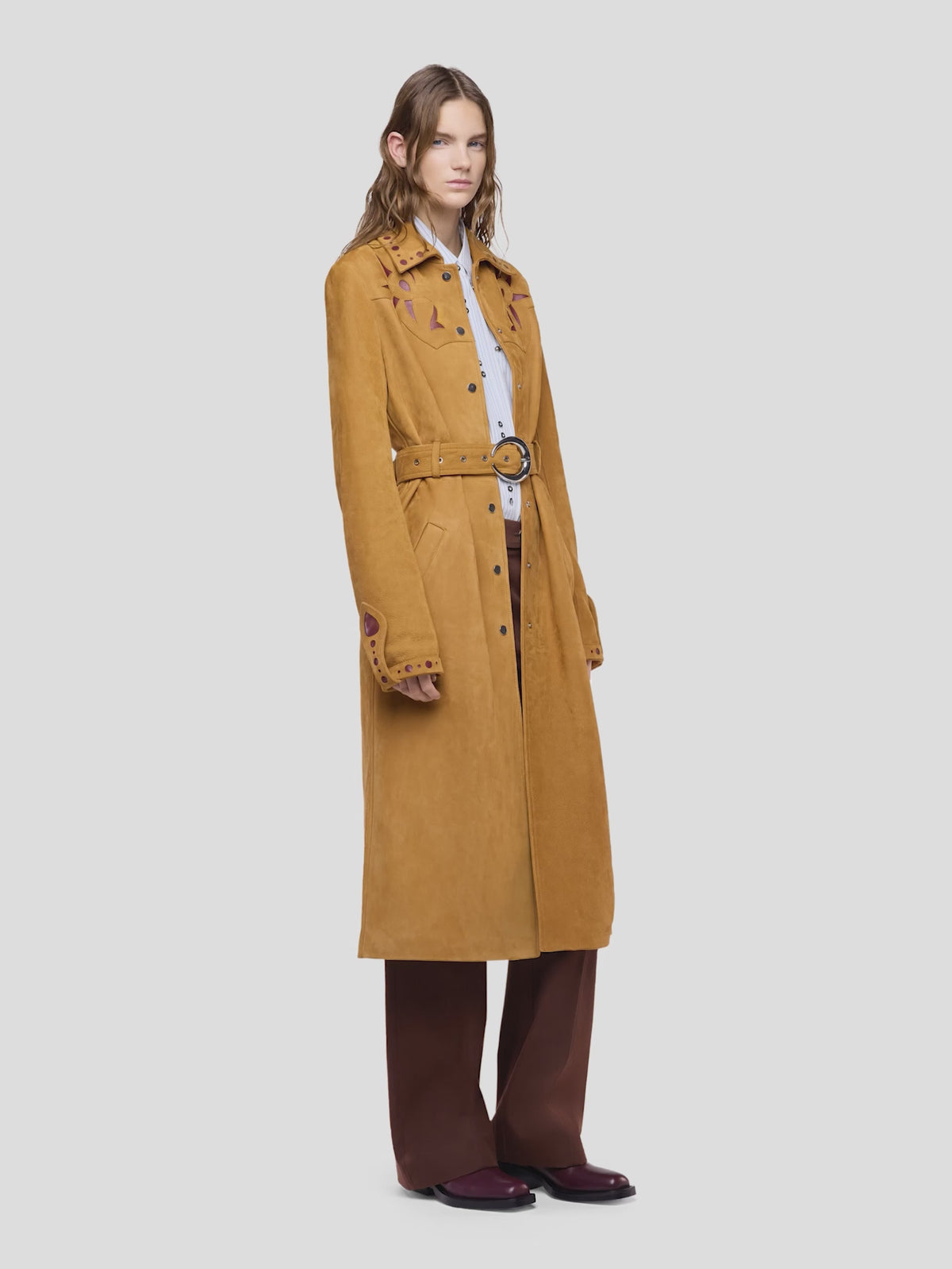 Straight camel leather trench coat with embellishments